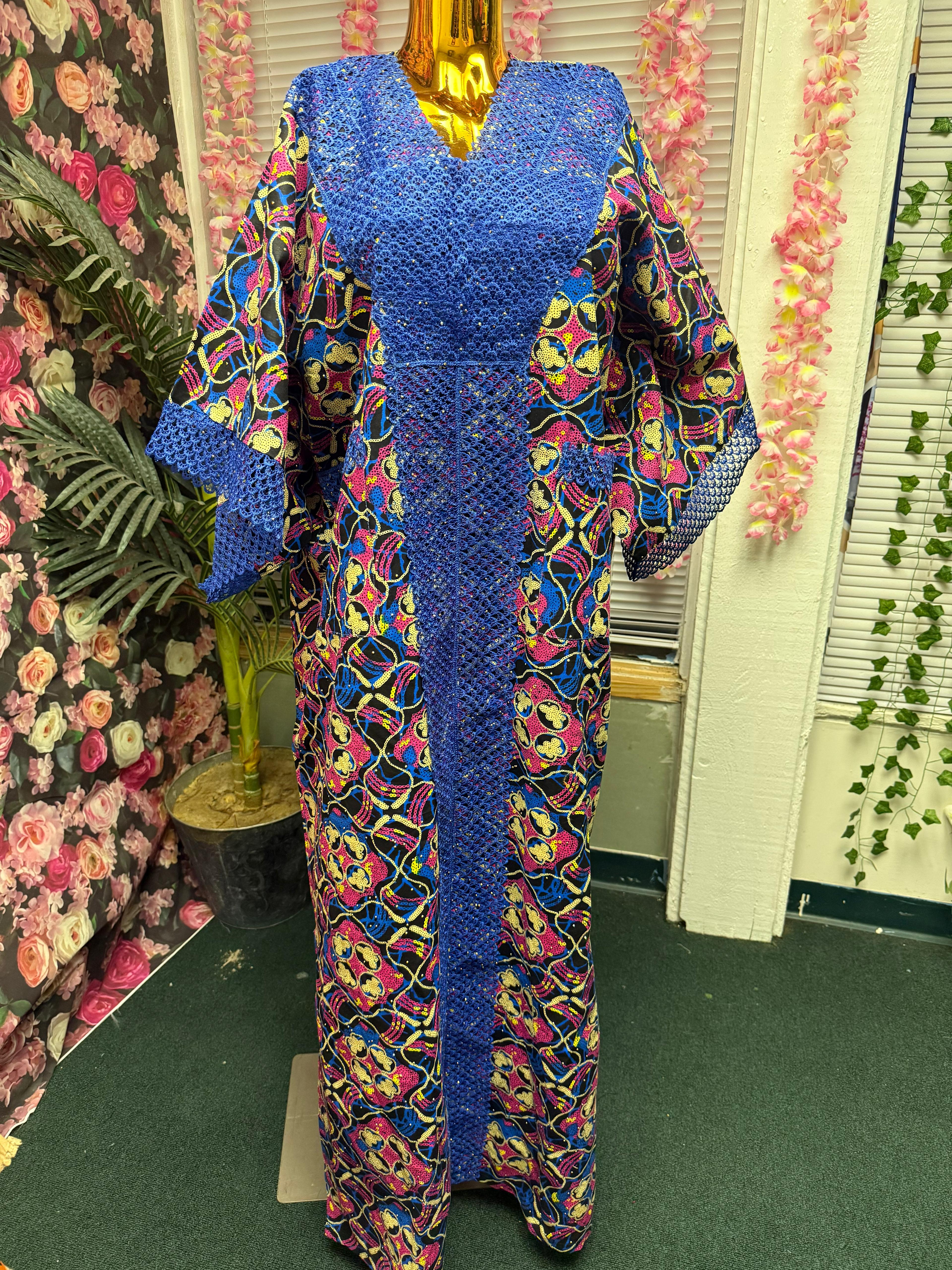 Adejoke dress is made with 100% cotton Ankara fabrics, customized with trimmings and embellished with rhinestones stones.